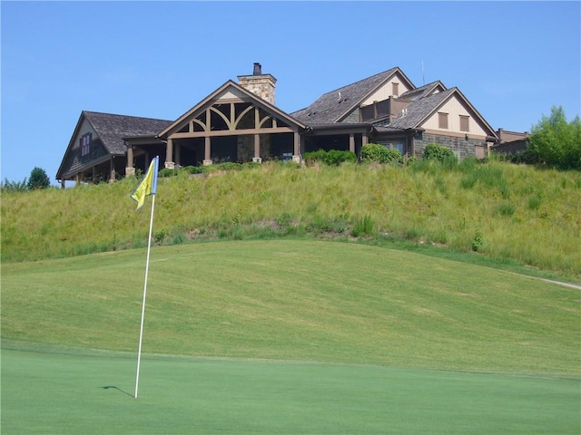 view of community featuring a lawn