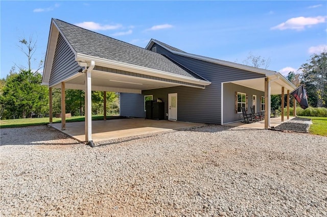 exterior space with a carport