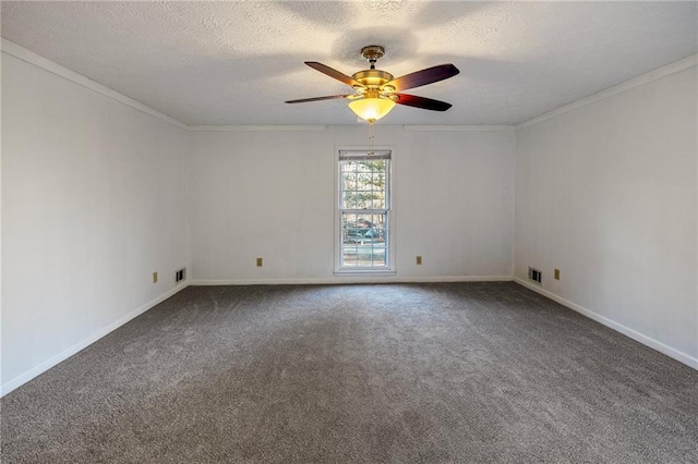 carpeted spare room featuring crown molding and ceiling fan