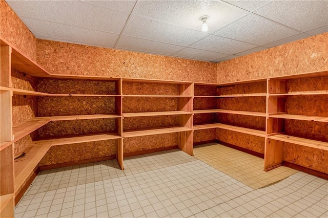 wine area featuring a paneled ceiling