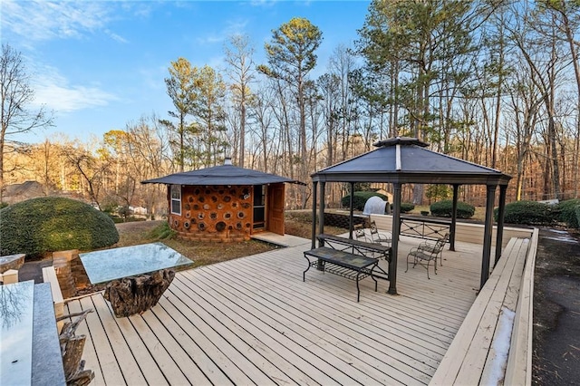 wooden terrace with a gazebo