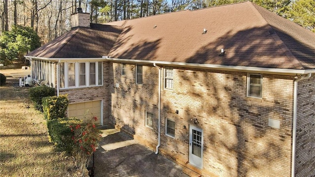 view of property exterior with a garage