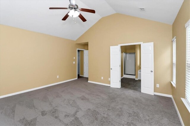 unfurnished bedroom with baseboards, carpet floors, high vaulted ceiling, and a ceiling fan