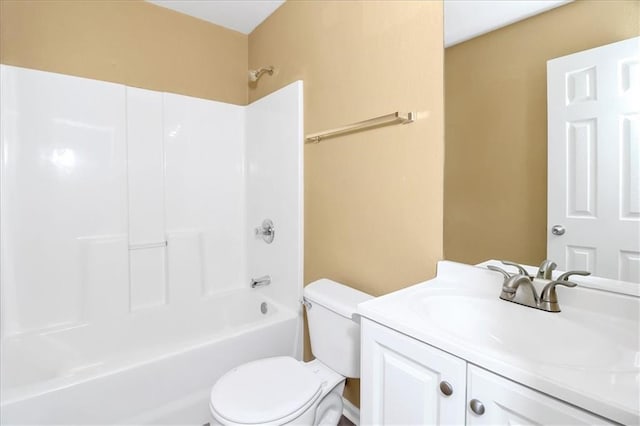 bathroom featuring shower / bathtub combination, toilet, and vanity