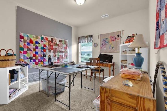 rec room featuring a desk and carpet floors