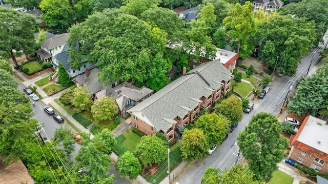 birds eye view of property with a residential view