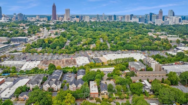 birds eye view of property with a city view