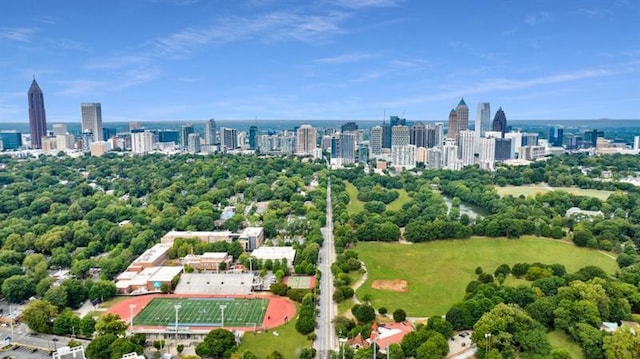 birds eye view of property featuring a city view