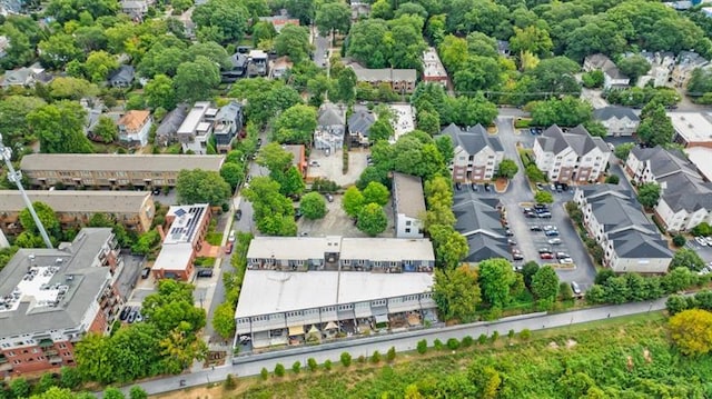 birds eye view of property with a residential view