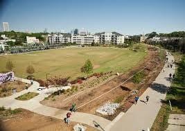 birds eye view of property featuring a city view