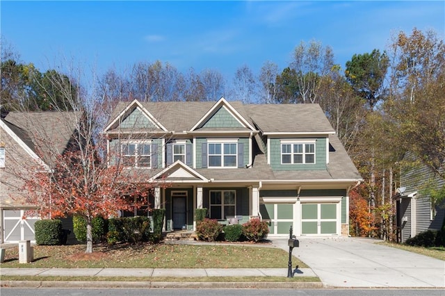 craftsman inspired home with a garage