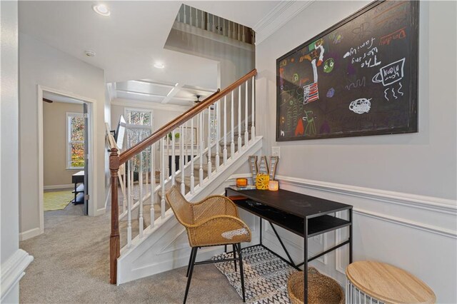 stairway with carpet, beamed ceiling, crown molding, and coffered ceiling