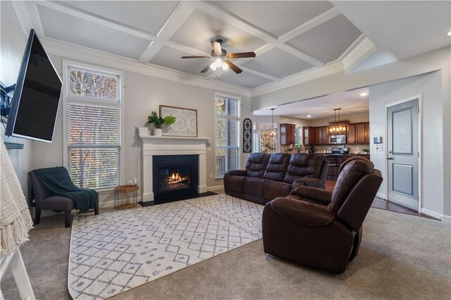 living room with light carpet and crown molding