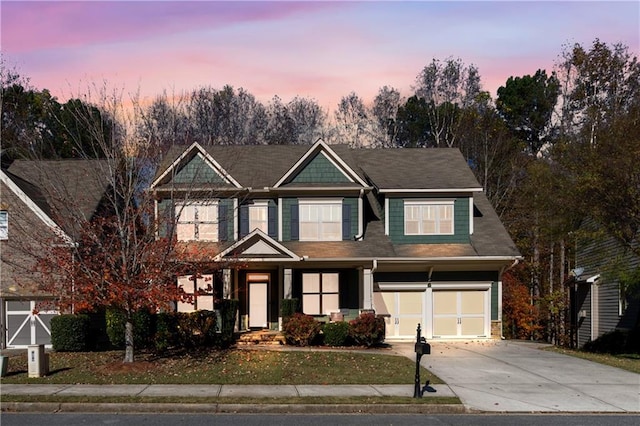 craftsman house featuring a garage