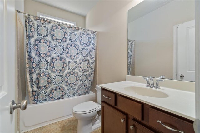 full bathroom with tile patterned flooring, vanity, toilet, and shower / tub combo with curtain