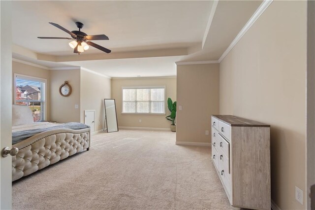 bedroom featuring ceiling fan, light colored carpet, ornamental molding, and multiple windows