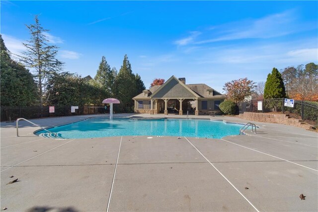 view of pool featuring a patio