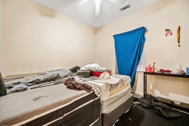 bedroom with visible vents, baseboards, and a ceiling fan