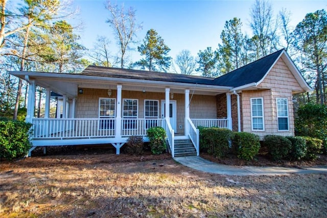 ranch-style house with a porch