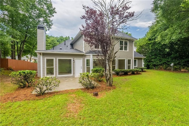 3807 Lance Bluff Ct, Duluth, GA 30097 - back of house featuring a patio and a chimney
