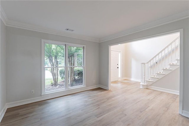 3807 Lance Bluff Ct, Duluth, GA 30097 - empty room with wood finished floors, crown molding, and stairs