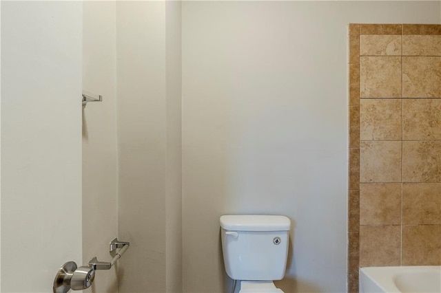 bathroom featuring toilet