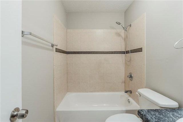 full bathroom featuring shower / tub combination, a textured ceiling, and toilet