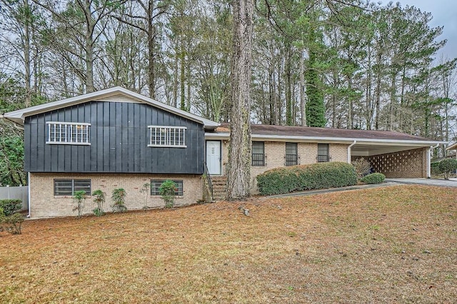 tri-level home featuring a carport