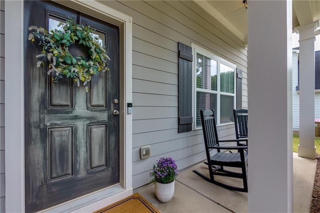 property entrance with a porch