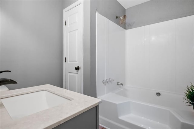 bathroom with shower / tub combination and vanity