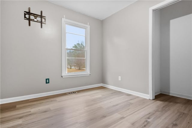 empty room featuring light hardwood / wood-style floors