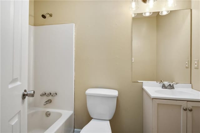 full bathroom with vanity, tub / shower combination, and toilet