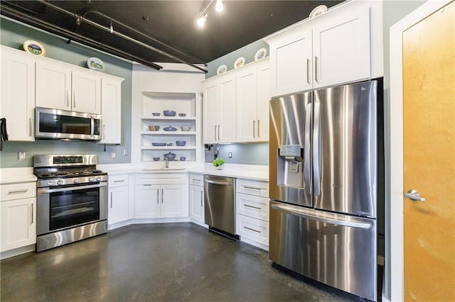 kitchen featuring open shelves, stainless steel appliances, light countertops, white cabinetry, and a sink