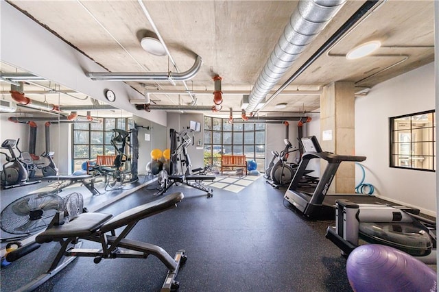 exercise room with baseboards