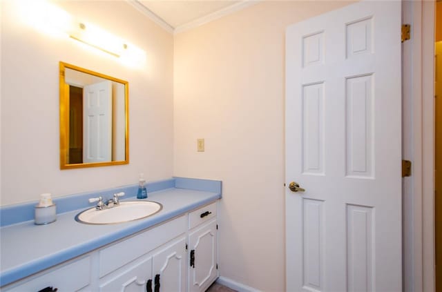 bathroom with vanity and crown molding