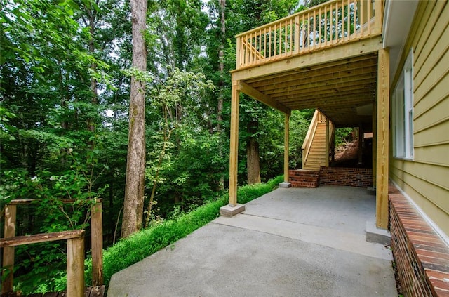 view of patio / terrace featuring a wooden deck