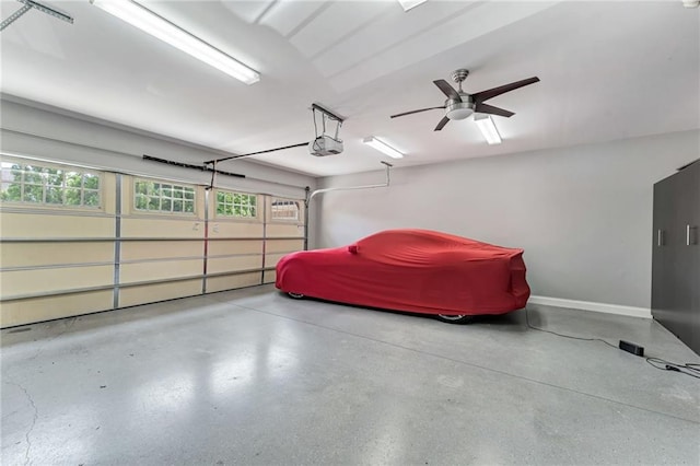 2444 Ballantrae Cir, Cumming, GA 30041 - garage with baseboards and a garage door opener
