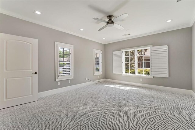 2444 Ballantrae Cir, Cumming, GA 30041 - unfurnished room with visible vents, crown molding, baseboards, and ceiling fan