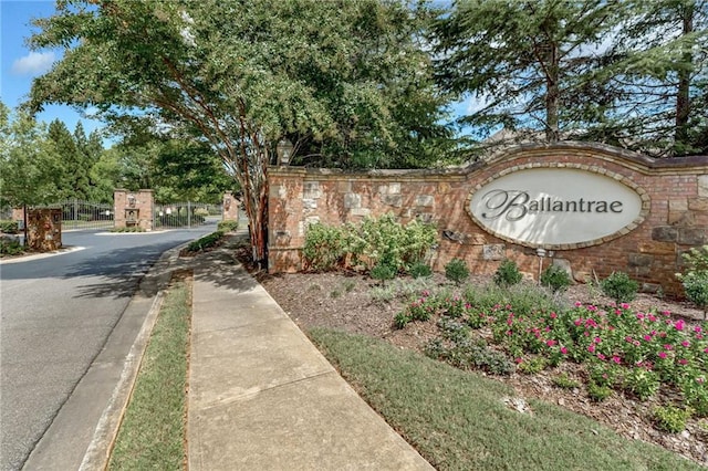 2444 Ballantrae Cir, Cumming, GA 30041 - community / neighborhood sign featuring a gate and fence