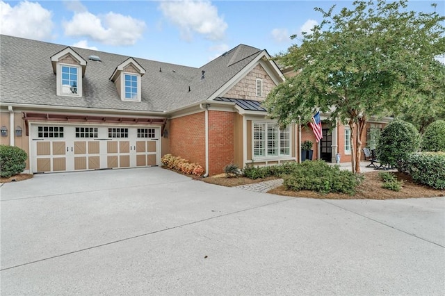 2444 Ballantrae Cir, Cumming, GA 30041 - view of front of house featuring a garage, driveway, roof with shingles, and brick siding
