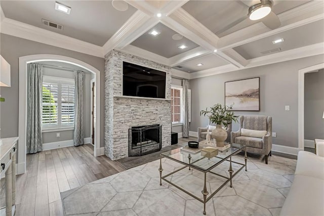 2444 Ballantrae Cir, Cumming, GA 30041 - living room featuring visible vents, crown molding, baseboards, light wood-style floors, and coffered ceiling