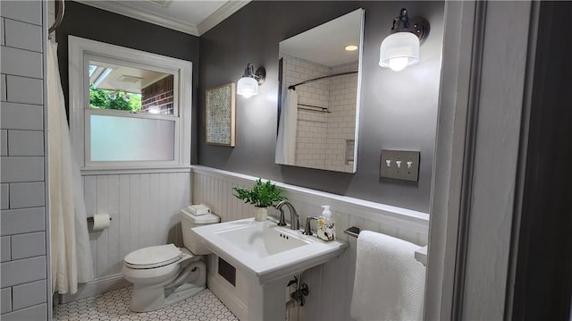 2132 Clairmont Rd, Brookhaven, GA 30033 - bathroom with a shower with curtain, toilet, ornamental molding, tile patterned floors, and a wainscoted wall