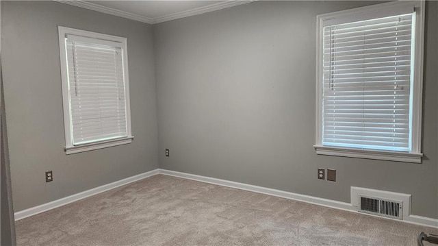 2132 Clairmont Rd, Brookhaven, GA 30033 - carpeted empty room with baseboards, visible vents, and ornamental molding