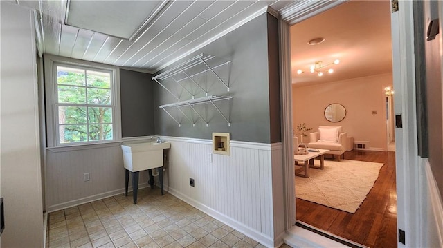 2132 Clairmont Rd, Brookhaven, GA 30033 - laundry room featuring baseboards, hookup for a washing machine, wainscoting, laundry area, and electric dryer hookup