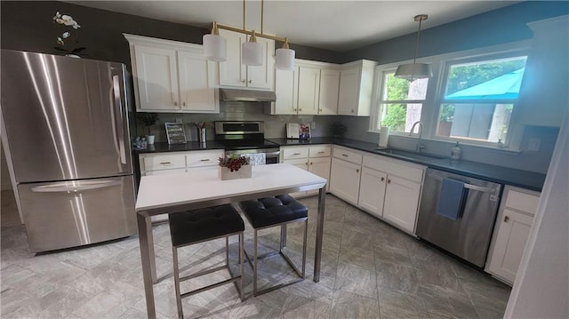 2132 Clairmont Rd, Brookhaven, GA 30033 - kitchen with a sink, stainless steel appliances, tasteful backsplash, under cabinet range hood, and white cabinets