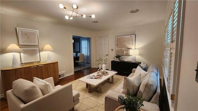 2132 Clairmont Rd, Brookhaven, GA 30033 - living area with an inviting chandelier, ornamental molding, wood finished floors, and visible vents