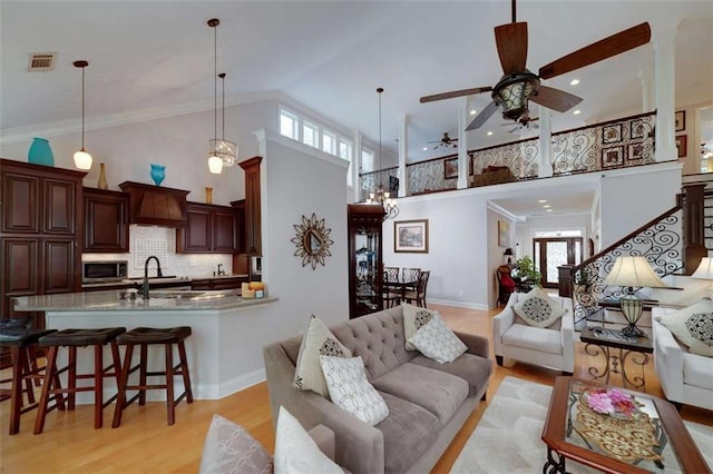 825 Chalet Hls, Mcdonough, GA 30253 - living area with light wood-style flooring, high vaulted ceiling, ceiling fan, and recessed lighting