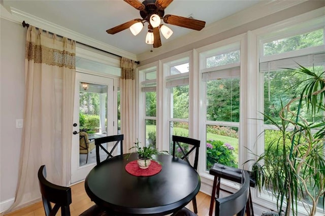 825 Chalet Hls, Mcdonough, GA 30253 - sunroom featuring healthy amount of natural light, ornamental molding, and wood finished floors