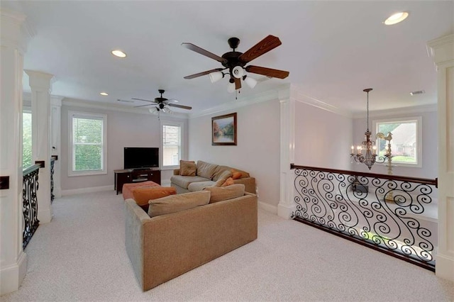 825 Chalet Hls, Mcdonough, GA 30253 - carpeted living room with ornate columns, recessed lighting, crown molding, a ceiling fan, and a chandelier