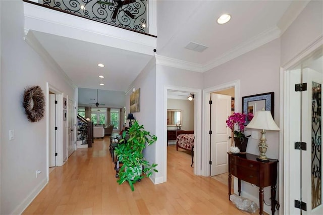 825 Chalet Hls, Mcdonough, GA 30253 - corridor featuring ornamental molding, light wood-style floors, and recessed lighting